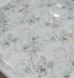 Клеенка столовая силиконовая с печатью 1,2х20м 0,65мм серебро/прозрачный фон Dekorelle 180-S